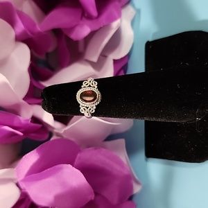 Beautiful size 4 red garnet sterling silver ring. NWOT
